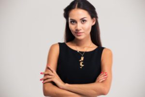 Woman Arms Folded Shutterstock 304807319