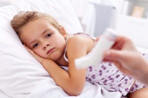 Asthma Sad Child With Inhaler Shutterstock 93530611