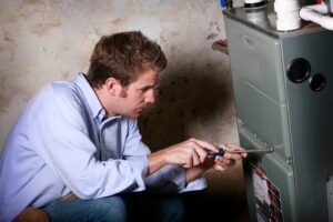 technician fixing HVAC problems