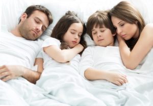 Comfort Carefree Family Sleeping Shutterstock 280019618
