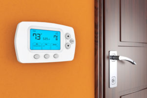 Cost Programmable Thermostat Near Door Shutterstock 244295881