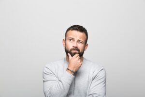 Man wondering why his furnace is loud